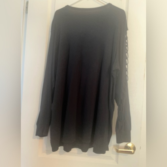 Torrid Heritage knit. Black long sleeve shirt. Cut out on the chest & sleeves 3X - Picture 2 of 6